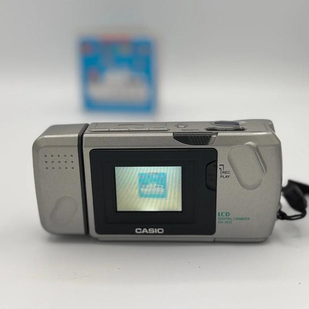 Casio QV-200 LCD Digital Camera Silver Vintage Rotating Lens QV200 Tested Works